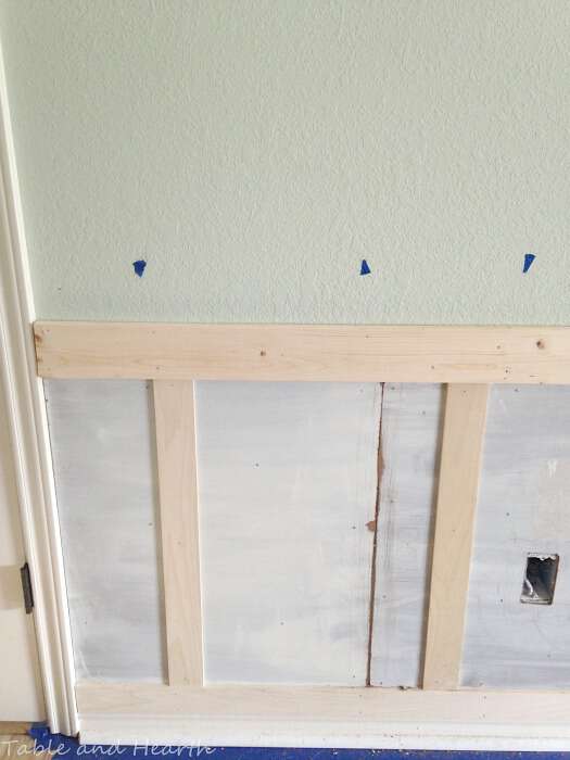 Need a little "oomph" in your space? This DIY Board and Batten Wainscoting is simple to achieve and instantly brings warmth and interest to any space!