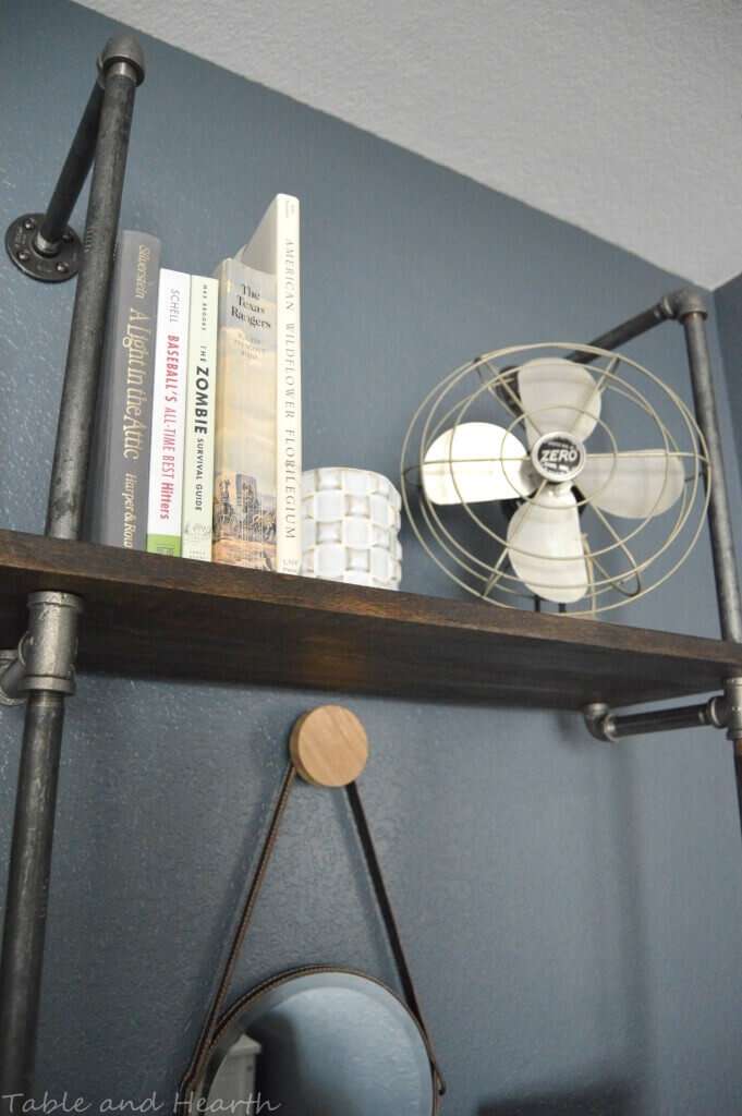 Step-by-step tutorial on how to make a customizable DIY industrial pipe bookshelf unit