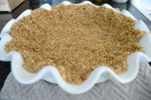 Classic key lime pie with a browned butter graham cracker and gingersnap crust