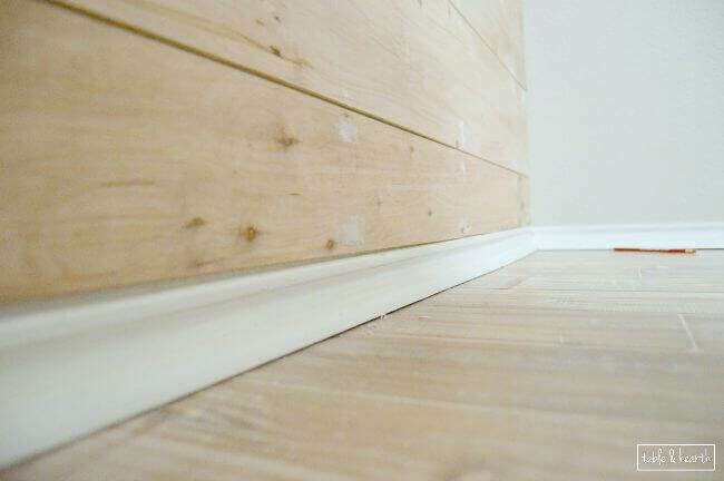 GORGEOUS!! Installing your own shiplap can be super easy! This is a great tutorial by Table & Hearth for how to install a DIY shiplap planked wall using simple plywood underlayment. www.tableandhearth.com