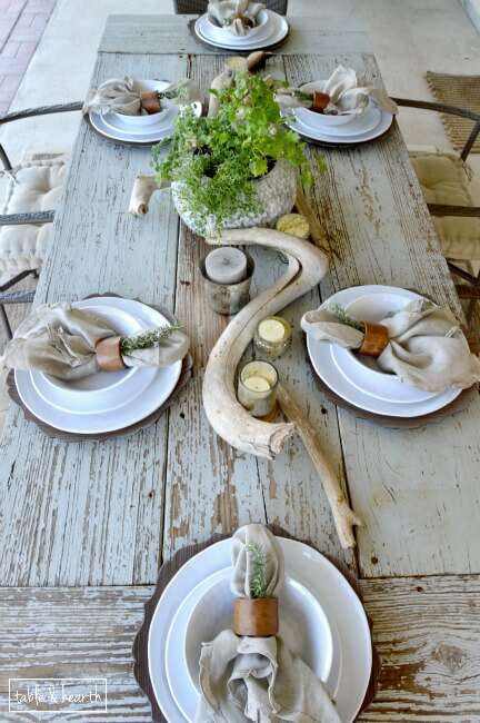 AMAZING! Table & Hearth completely transformed this boring, bare, and beat up patio space into a relaxed, neutral, and weathered coastal-meets-farmhouse space that's perfect for entertianing! Great DIYs and curated decor make it such a beautiful space.