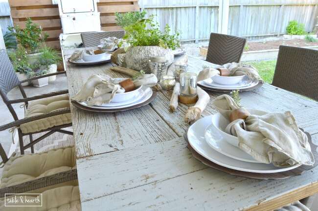 AMAZING! Table & Hearth completely transformed this boring, bare, and beat up patio space into a relaxed, neutral, and weathered coastal-meets-farmhouse space that's perfect for entertianing! Great DIYs and curated decor make it such a beautiful space.