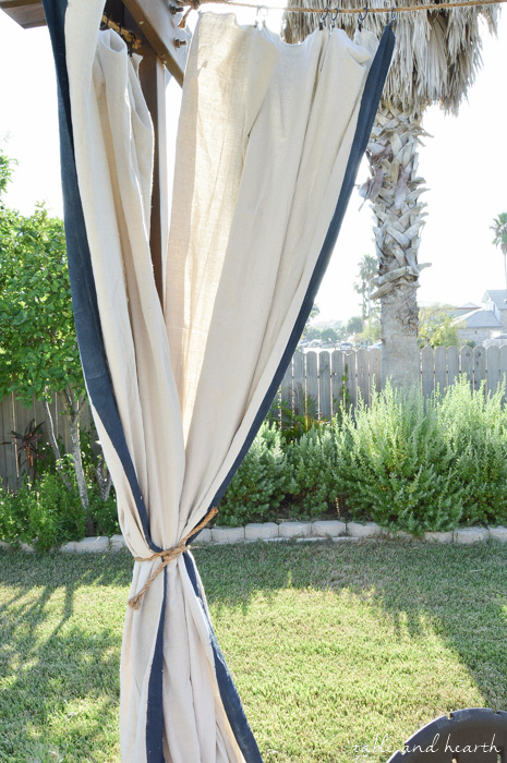 High Style, Low Budget - Bring elegance and luxury to your outdoor space without spending a fortune by making these DIY No-Sew Outdoor Curtains! www.tableandhearth.com