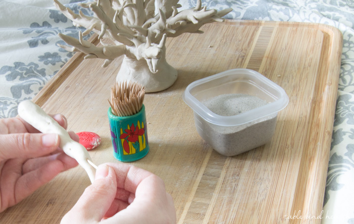 How to DIY Faux Coral - Using air dry clay, it's easy to form your own coral sculpture to use in your coastal home decor! www.tableandhearth.com