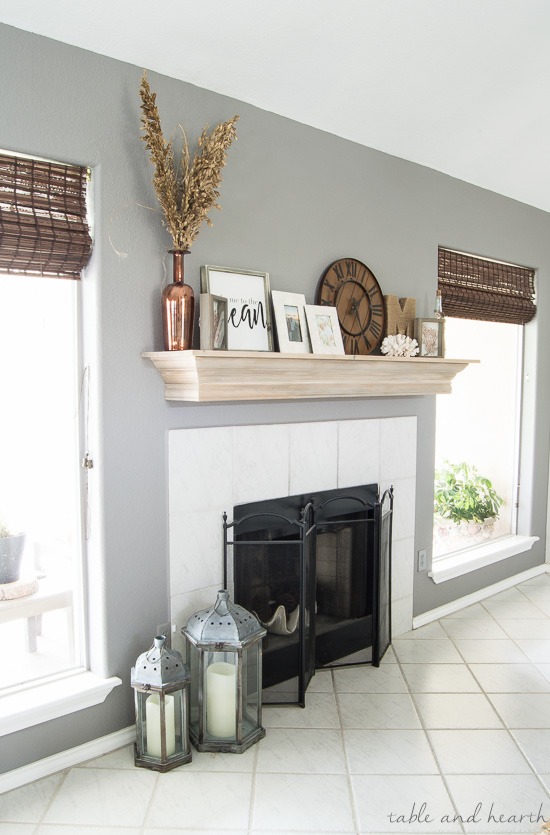 An easy DIY mantel update with crown molding! Perfect solution for that ugly boring mantel!