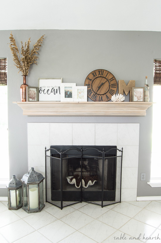 An easy DIY mantel update with crown molding! Perfect solution for that ugly boring mantel!