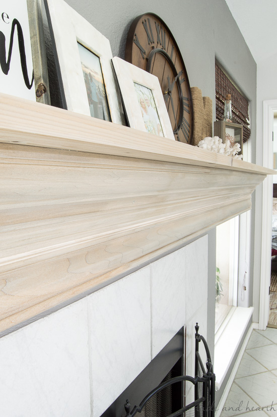 An easy DIY mantel update with crown molding! Perfect solution for that ugly boring mantel!