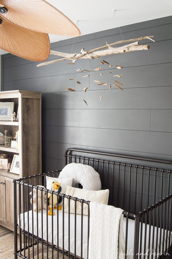 Beautiful and easy for a coastal nursery! DIY driftwood mobile at www.tableandhearth.com