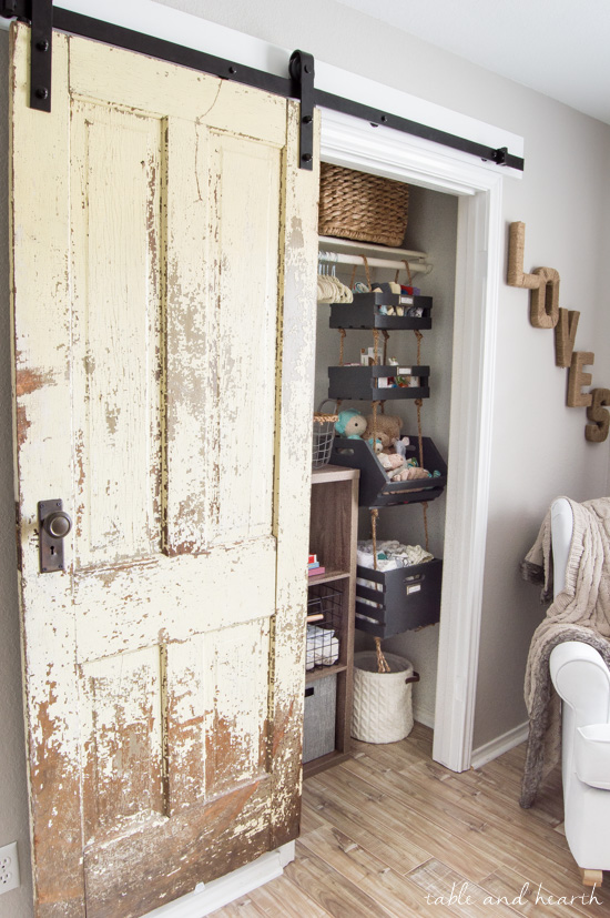 Finally a step-by-step walkthrough on how to install an antique barn door! www.tableandhearth.com