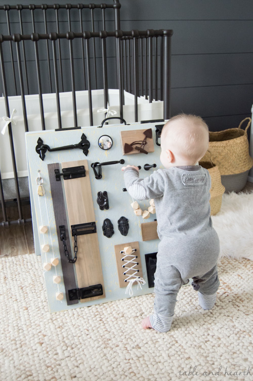 Keep your little one occupied while keeping your style too, check out this stylish rustic baby busy board from www.tableandhearth.com!