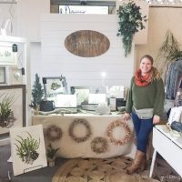 Amazing rustic white art booth for a holiday market!