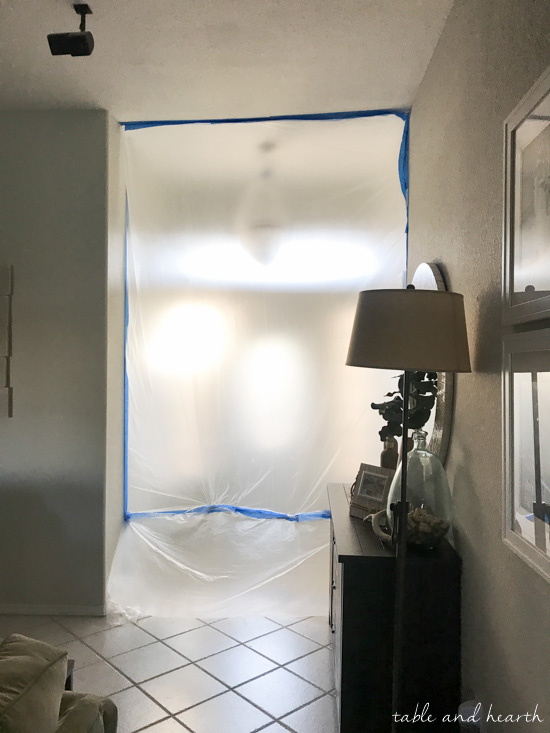 Installing a new entry door unit on a stucco home can be a daunting project. See how it went for this blogger's crew as they installed a beautiful new unit on a mid-90s stucco home! #thermatrudoors #entrydoor #wooddoor #fiberglassdoor www.tableandhearth.com